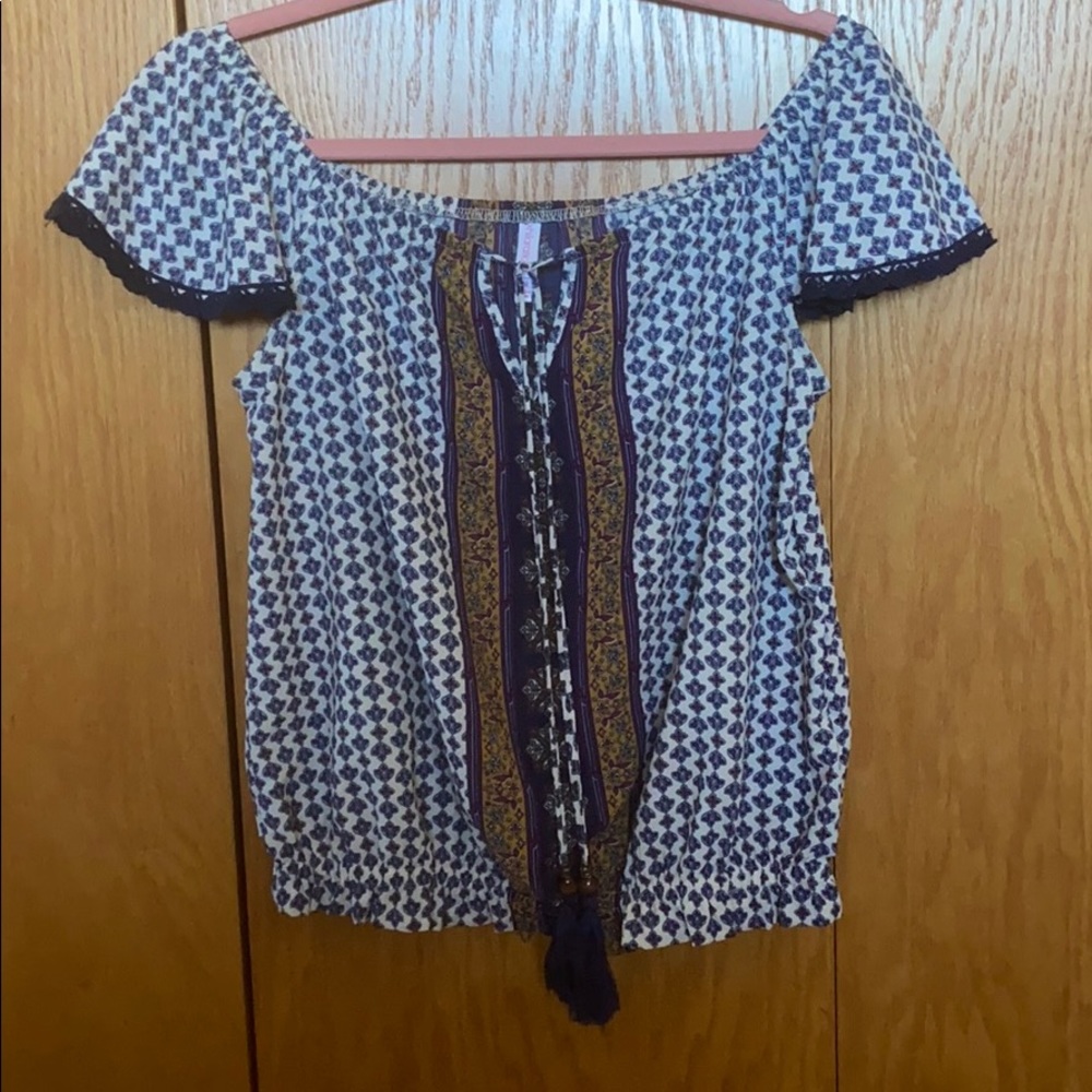 Off the shoulder patterned top.